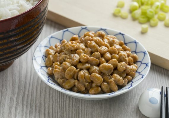 Bowl with traditional Japanese fermented soybeans called natto